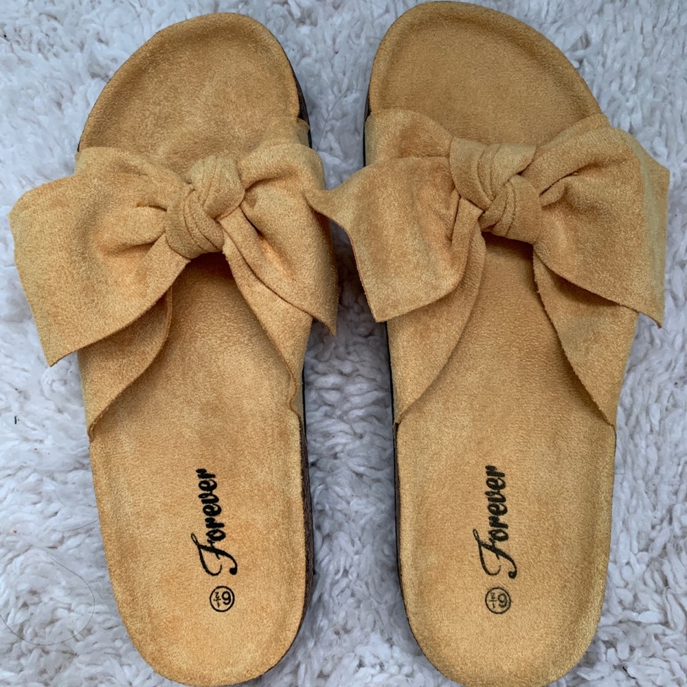 Mustard yellow  bow sandals .